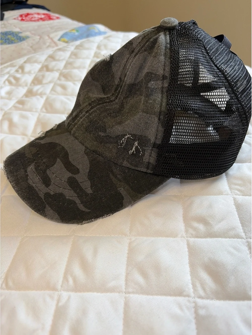 C.C. Distressed Camo Ponytail trucker hat